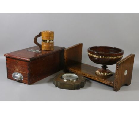 An Edwardian inlaid bookrack, two porcupine quill decorated vessels, an old shop till and an oak cased wall barometer.
