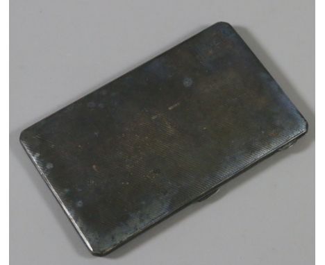 A large silver cigarette case with engine turned decoration assayed Birmingham 1936. 208 grams.