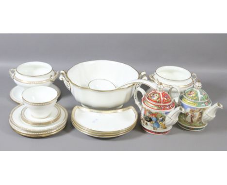 A Wedgwood and Hammersley part tea and dinner service decorated in gilt along with two Sadler collectors teapots.