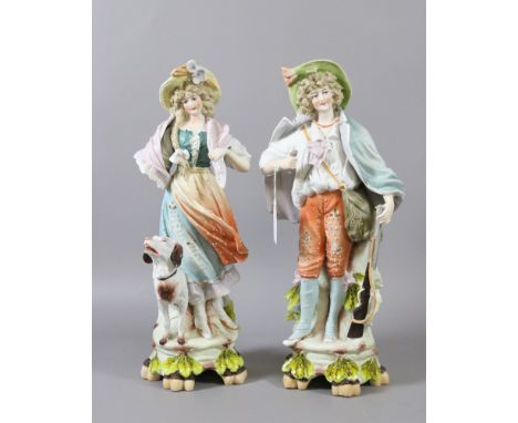 A large pair of Victorian bisque figures.
