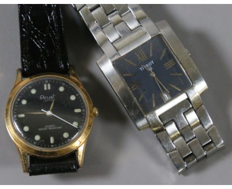 Two gentleman's Quartz wristwatches including Tissot watch with date window and on stainless steel bracelet.