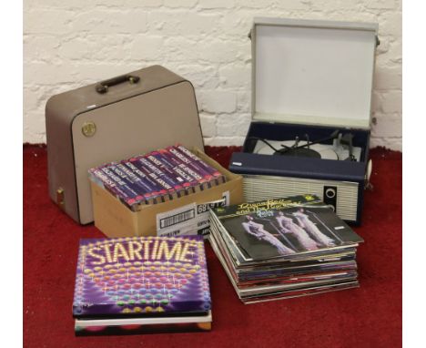 A Fidelity record player and records (AF) along with a cased Singer sewing machine and a box of books.