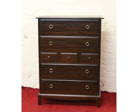 A Stag Minstrel seven high chest of drawers raised on bracket feet.