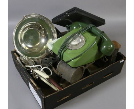 A box of metalwares to include old blow lamp, hobbing foot, oil can, flat irons, trivets and a GPO telephone.