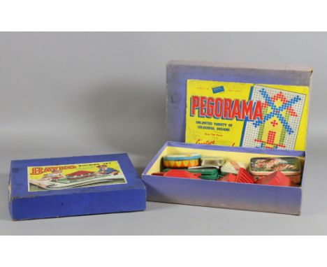 Two boxed Bayko building sets.