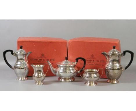 A Garrard & Co Ltd five piece silver plated tea service in original cardboard packing cases.