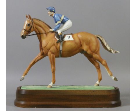 A Royal Worcester coloured bisque model of the race horse Grundy & Jockey Pat Eddery.