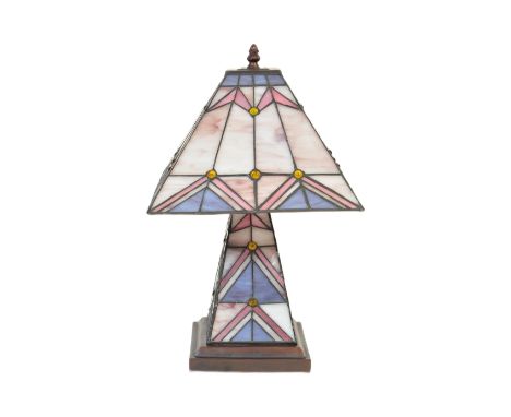 A 20th century Art Deco style Tiffany manner table lamp. Angular mushroom form with coloured stained and leaded&nbsp; glass p