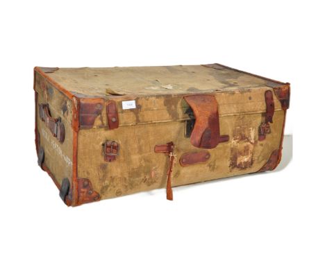Early 20th century green, leather and wooden bound D-Mob steamer trunk chest. Of rectangular construction having wooden bound