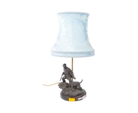 A vintage 20th century metal desk table lamp light. The lamp having a light blue shade over a metal base in the shape of a hu