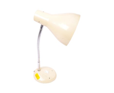 A retro vintage 20th century cream goose neck table desk lamp. The light having a conical shade over an adjustable goose neck