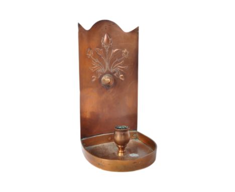 A Victorian 19th century&nbsp; Arts and Crafts copper chamber stick. The candlestick holder having impressed patterns to exte