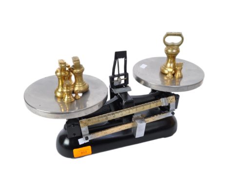 A retro vintage mid 20th Century J W Towers &amp; Co Ltd, Widnes, London pair of weighing scales. With an ebonised metal fram