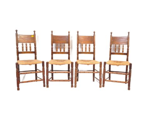 A set of four early 20th century North country oak dining chairs. The chairs with bobbin turned spindle gallery back rests ov
