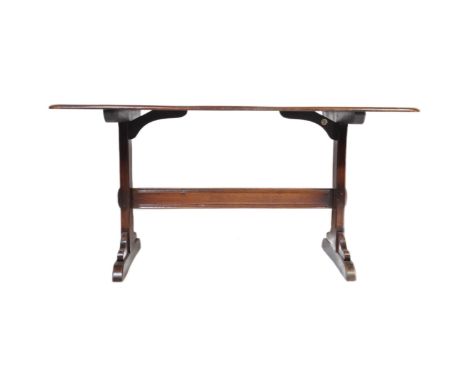 Lucian Ercolani for Ercol Furniture - A retro 20th century beech and elm wood refectory dining table raised on splayed leg su