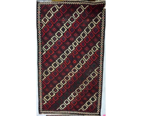 A vintage mid 20th century Persian Islamic South Wes Qashqai Kilim floor rug carpet having a series of repeating diamond shap