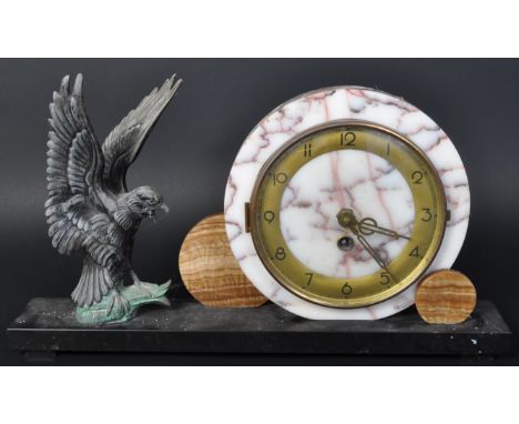 A 20th century French mantel clock. The clock having circular face with gilt chapter ring with Arabic numeral to surround, se