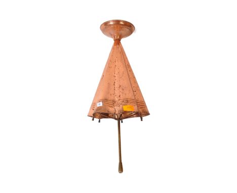 A 20th century copper umbrella stick stand in the form&nbsp;of an upturned umbrella. Measures 60cm tall.