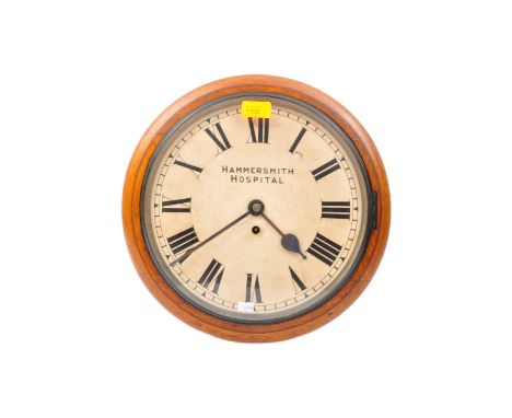 Camerer Cuss &amp; Co - A 19th century Victorian circa. 1880 Hammersmith Hospital oak cased wall clock. The clock having whit