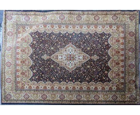 A large vintage 20th Century Persian Islamic floor carpet rug. Having a central medallion with repeating foliate pattern encl