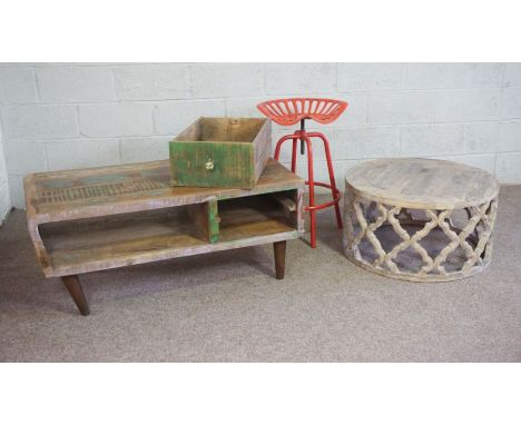 A pale hardwood coffee table, with quatrefoil trellis circular base, 77cm diameter; together with a low contemporary table, a