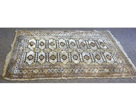 A group of three assorted decorative rugs, including a Shirvan style prayer rug, 20th century, decorated with stylised trees 