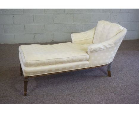 A small upholstered day bed, upholstered in light yellow damask, 150cm long