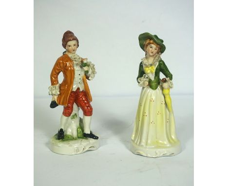 A Staffordshire flatback figure of a Lady and Gallant, she holding a Fallow Deer, 31cm high; together with assorted ceramic f