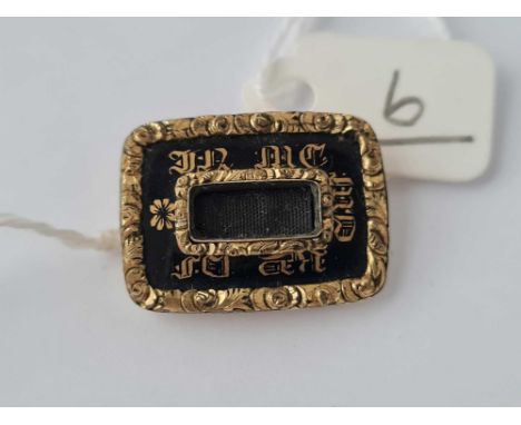 A Victorian gold and enamel memorial brooch dated 1838 pin missing 
