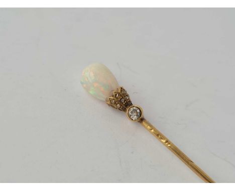 A Victorian high carat gold opal and diamond stick pin 