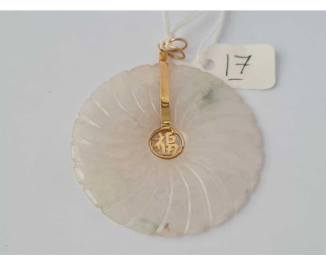 A large white jade pendant 5cm dia in 14ct gold mount 19.7g inc