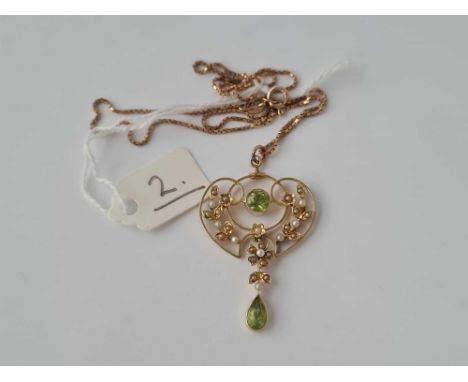 A art Nouveau and pearl and peridot pendant 15ct gold on 9ct neck chain 