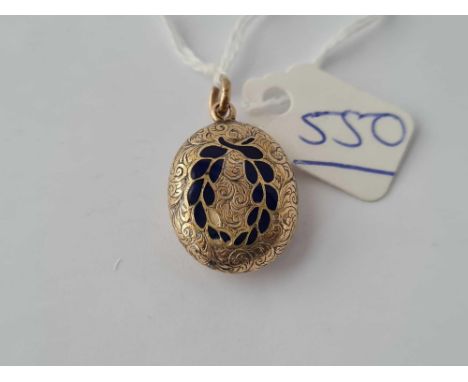 A gold and enamel hair pendant 