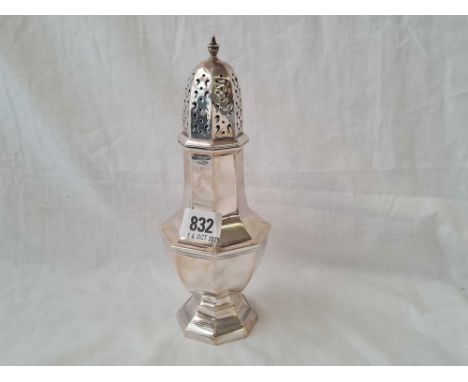 A large octagonal caster with urn finial - 9" high - Birmingham 1912 - 166 g.