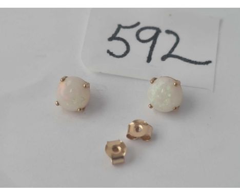 A pair of 9ct opal stud earrings