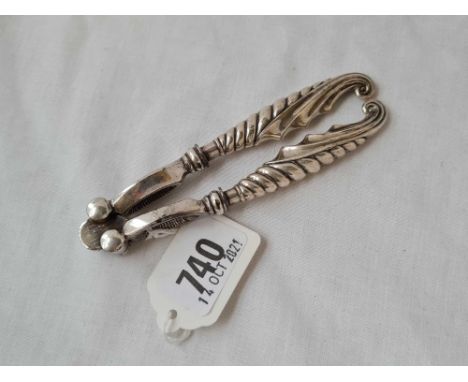 A silver handled nut cracker, B'ham 1899?