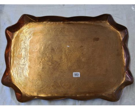 An Art Nouveau copper tray - 24" wide 