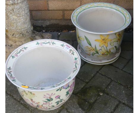A pair of contemporary Chinese floral enamel decorated jardinieres, on dish stands, each dia. 31.5cm