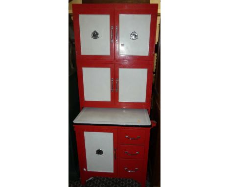 A mid-20th century painted kitchen cabinet, having an enamel pull-out preparation surface, five cupboard doors and three shor