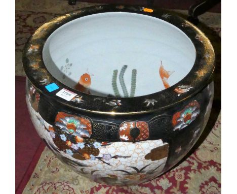 A contemporary Chinese glazed and enamel decorated stoneware jardiniere, of shouldered form and heightened in gilt, dia.42cm