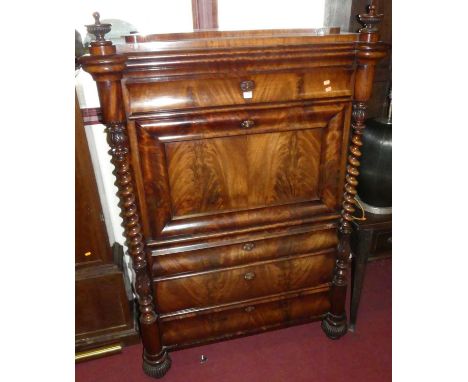 A mid-19th century French flame mahogany secretaire-d'abattant, having typical fall-front compartment fitted with serpentine 