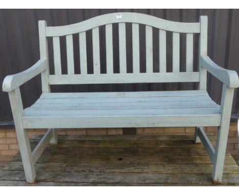 A contemporary painted slatted teak two-seater garden bench, w.112cm 