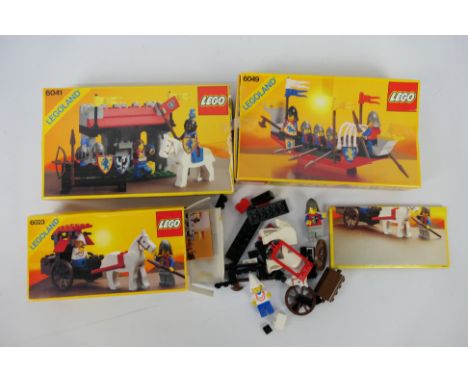 Lego - A trio of boxed vintage Lego sets. Lot includes Lego #6049 1987 'Viking Voyager'; #6041 1986 'Armour Shop'; and #6023 
