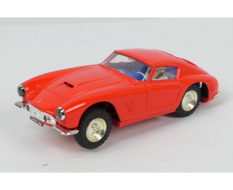 Scalextric - An unboxed Ferrari 250 GT Berlinetta # MM/C69. The model appears in Very Good condition with only light signs of