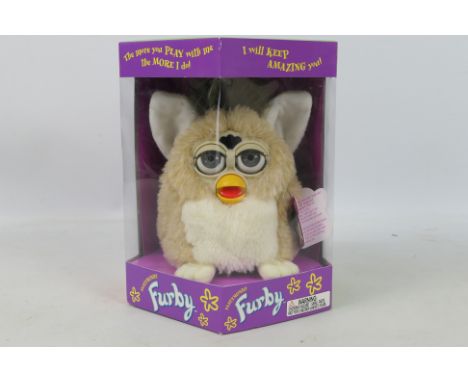 Hasbro - Tiger Electronics -  A boxed model #70-800 1999 Generation 2 'Bear' Electronic Furby by Hasbro. The Furby with light