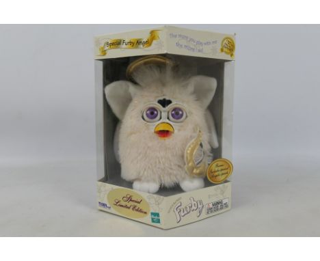 Hasbro - Tiger Electronics -  A rare boxed model #70795 (alternate no dash model number) Special Limited Edition 1998 'Angel'