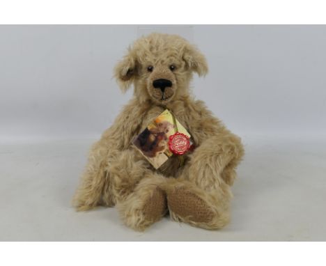 Teddy Hermann - "Monty" a Mohair Limited edition bear, number 240 of 2000. designed by Heather Lyell from New Zealand.  This 