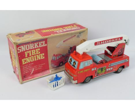 Yonezawa - A boxed vintage tinplate battery operated Snorkel Fire Engine from Yonezawa. The model appears to be in Excellent 
