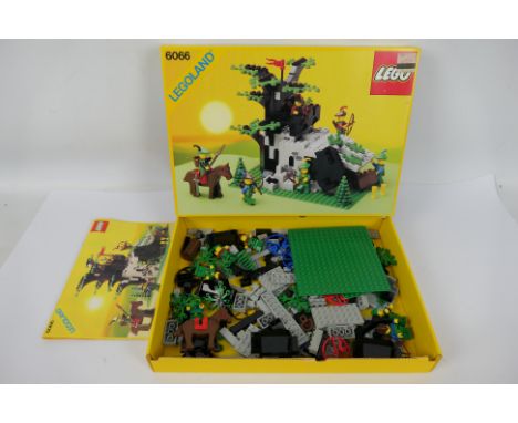 Lego - A boxed vintage 1987 Lego #6066 'Camouflaged Outpost' set. The set has been opened and shows signs of play, appearing 