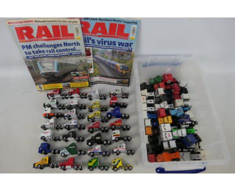  Matchbox- Over 60 x unboxed Matchbox die-cast model trucks and 3 x Rail magazines - Lot includes a 1:97 scale Mack CH600 'Po